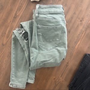 AE olive green destroyed skinny jeans